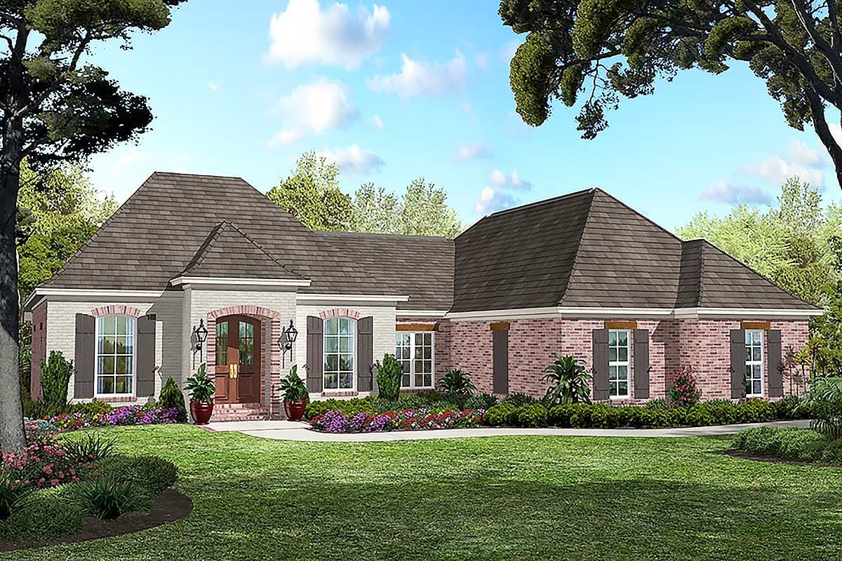 House plan exterior featuring a brick and white-painted brick facade, steeply pitched rooflines, and a centered arched entry.
