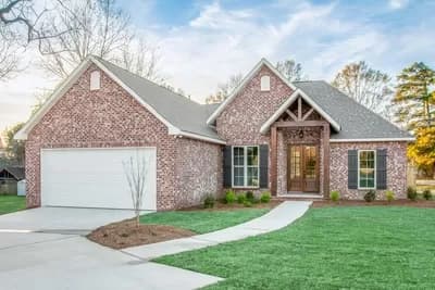 Traditional Home With Decorative Gabled Entry