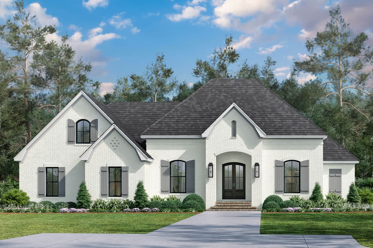 House plan exterior: Modern Farmhouse style, one-story with gabled dormers, arched entry, and brick facade.