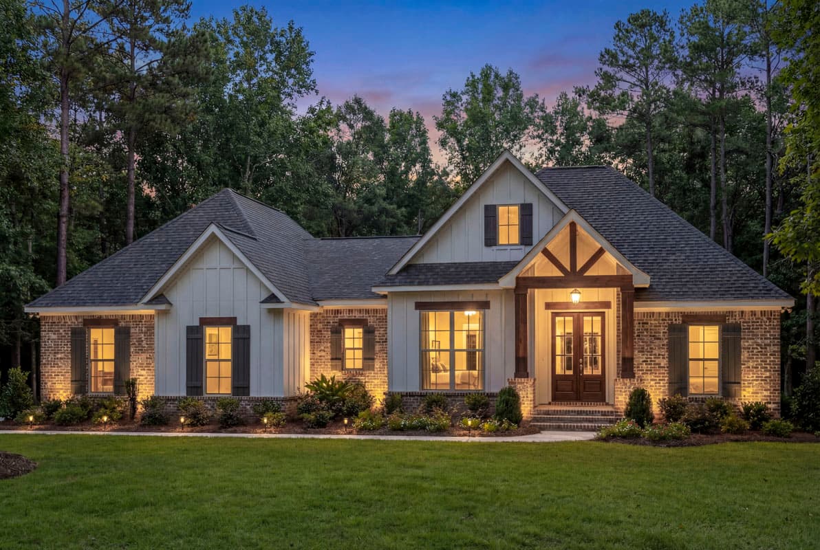 Modern Farmhouse house plan exterior: one story, gabled dormer, timber porch posts, double entry doors, board and batten siding, brick accents.