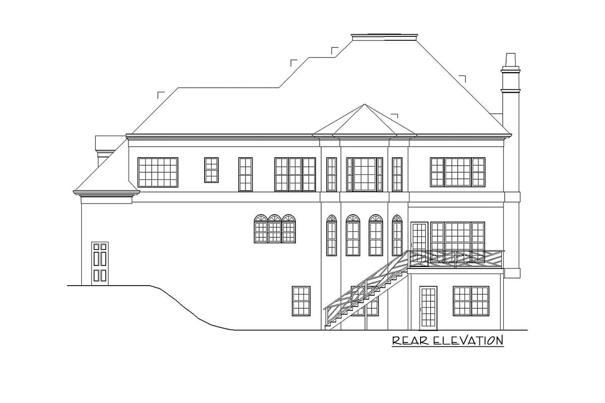 Rear elevation floor plan drawing showing a multi-story house with a large pitched roof, multiple gables, and a prominent chimney.