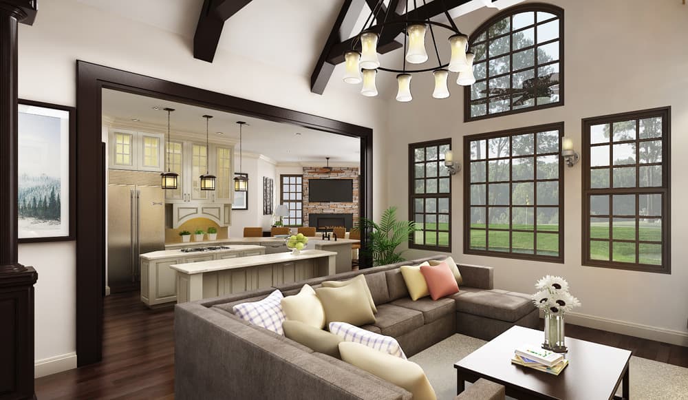 Great room with vaulted ceiling, exposed beams, and large grid windows, opening to a kitchen with island and double refrigerators.