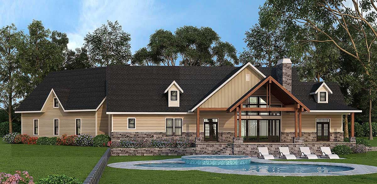 House plan exterior: One-story Modern Farmhouse with gabled dormers, stone foundation, and covered rear deck with exposed beams.