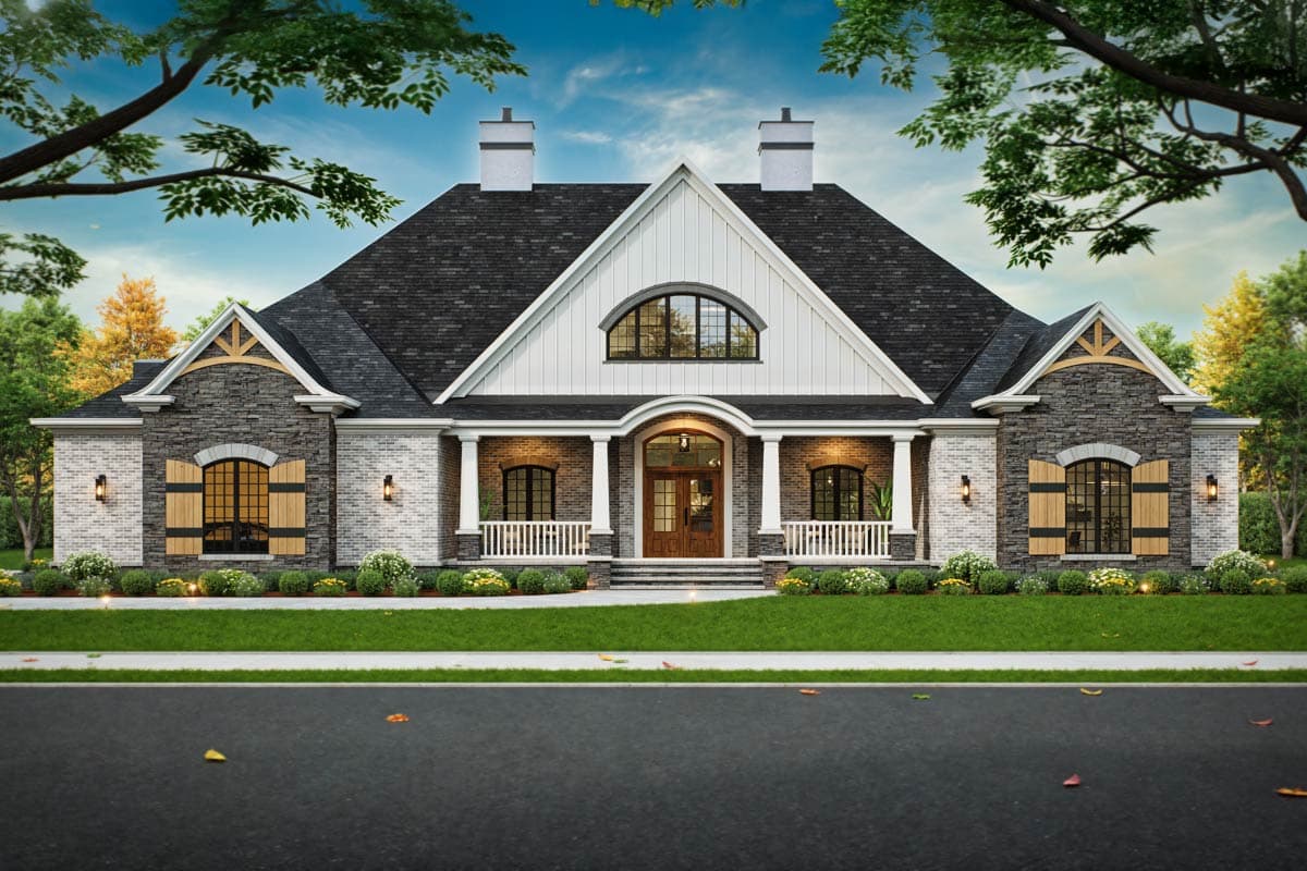 House plan exterior: Ranch style with stone and brick facade, covered entry porch, gables, dormers, and arched windows.