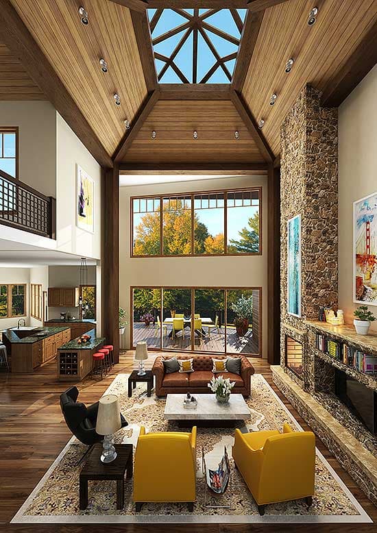 Open-concept great room with vaulted wood ceiling, skylight, stone fireplace, and large windows overlooking patio.