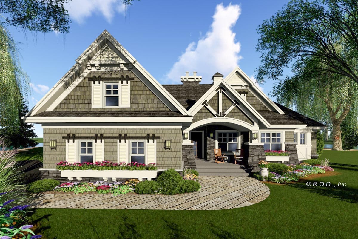 House plan exterior featuring a covered porch with stone columns, dormer windows, and decorative gable brackets. Two stories.