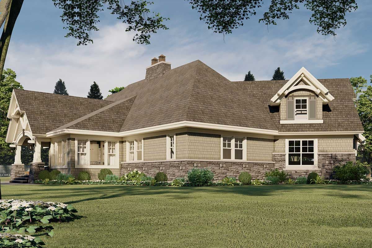 Craftsman house plan exterior with prominent gables, stone foundation, shingle siding, and covered entry.