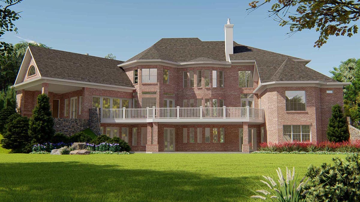 House plan exterior: Red brick dwelling with white railings on two levels, prominent gables, and a stone foundation.