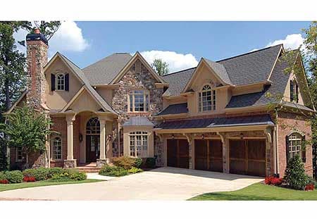 House plan exterior: Two-story home with stone accents, arched entryway, multiple gables, and a three-car garage.
