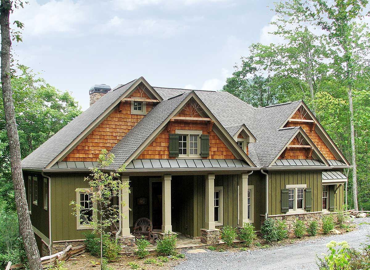 Craftsman style house plan exterior with a covered front porch, multiple gables, and cedar shake accents.