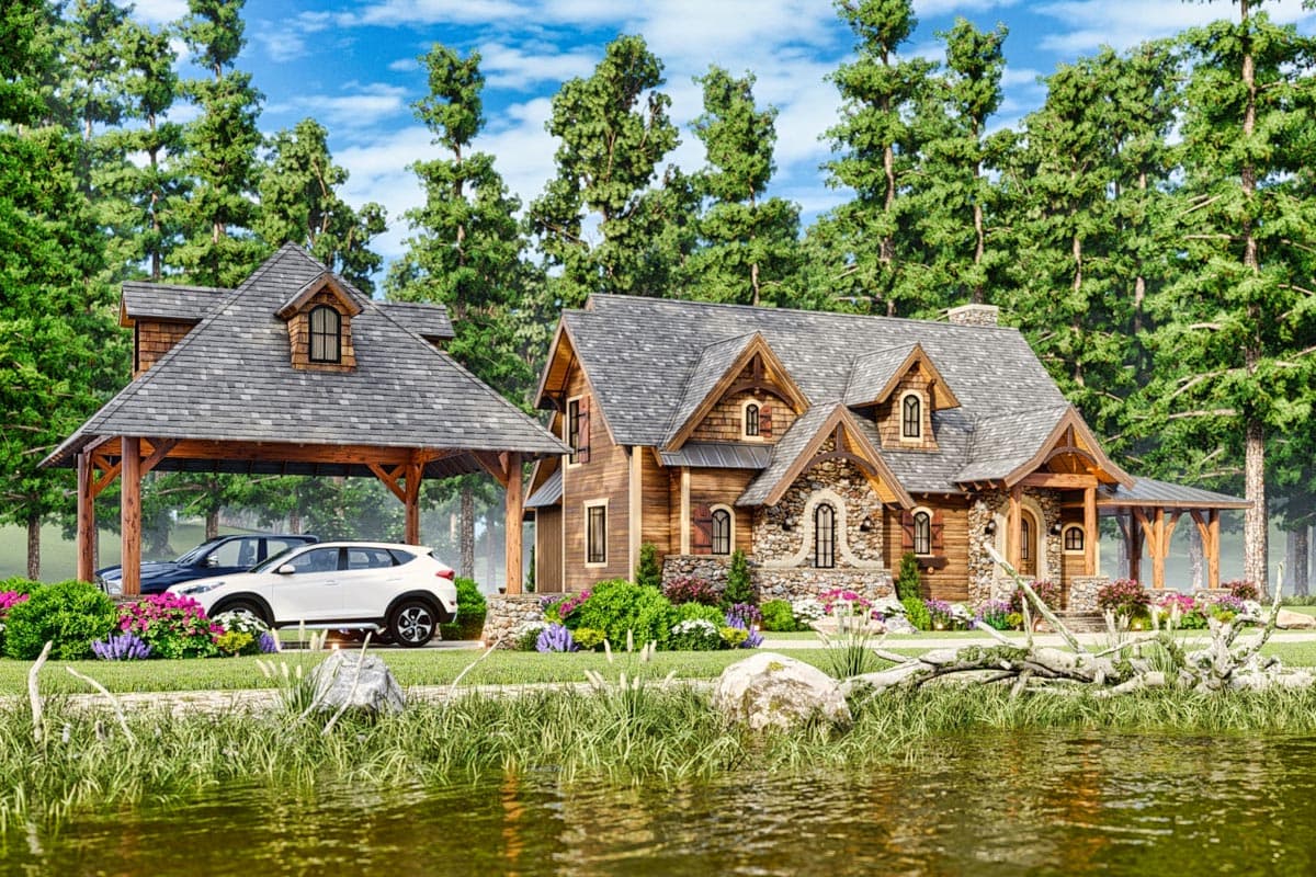 Wood and stone house plan exterior featuring a steeply pitched roof, dormers, covered porch, and attached carport with exposed timber framing.