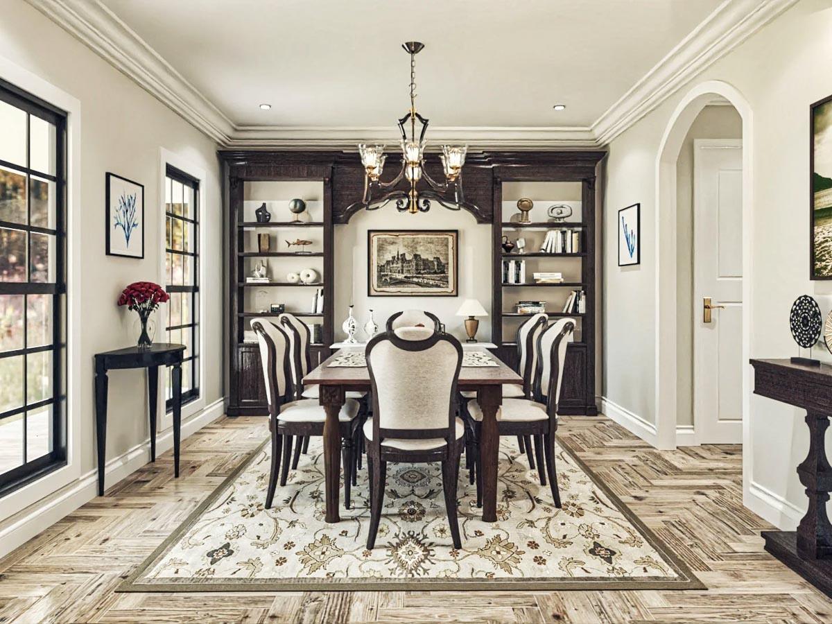 Dining room with built-in dark wood bookshelves, dining table with upholstered chairs, and large windows.