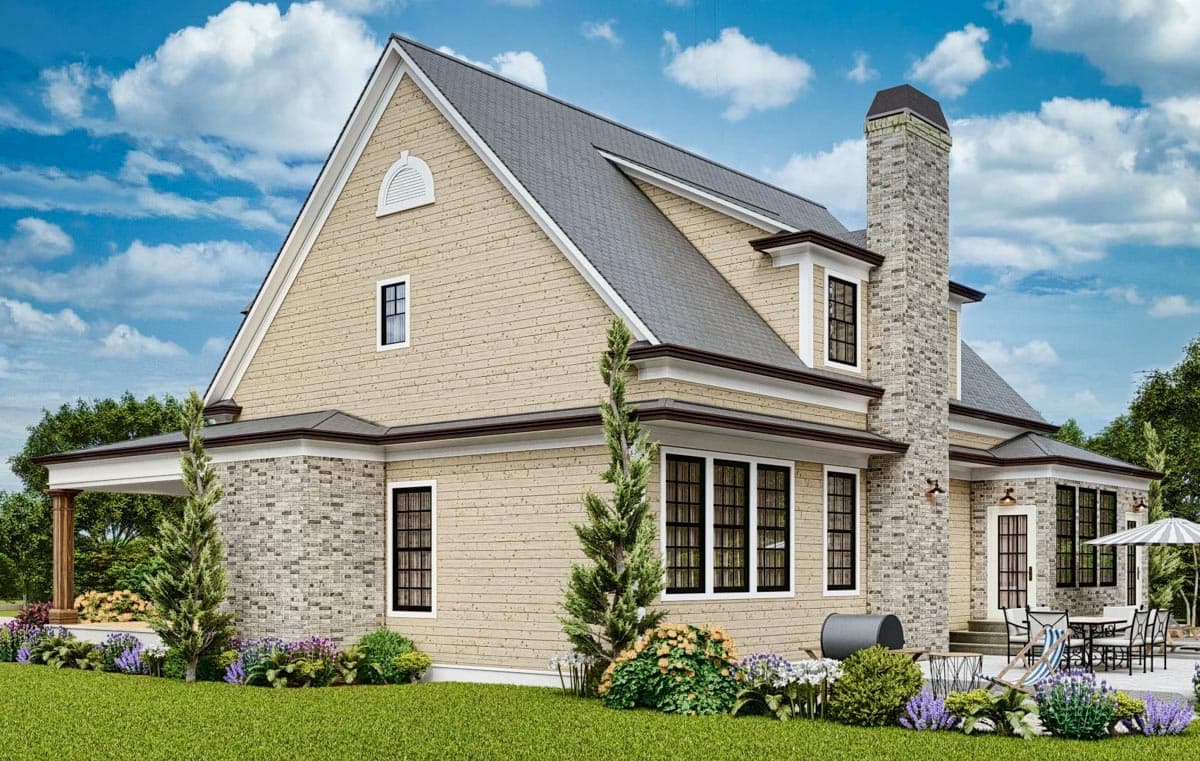 House plan exterior of a two-story home with vinyl siding, stone accents, dormers, a gabled roof, and a large brick chimney.