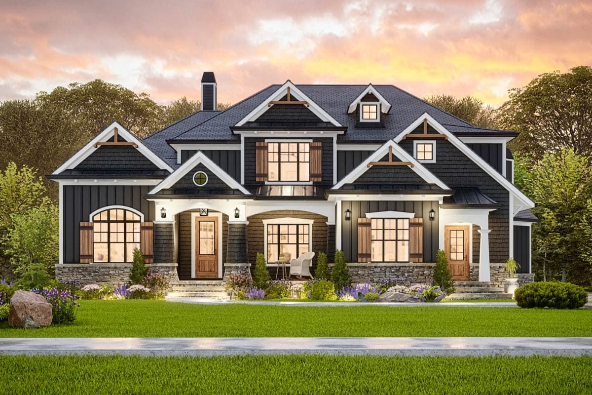 Craftsman style house plan exterior, two stories, dark siding, stone accents, multiple gables, dormers, and wood shutters.