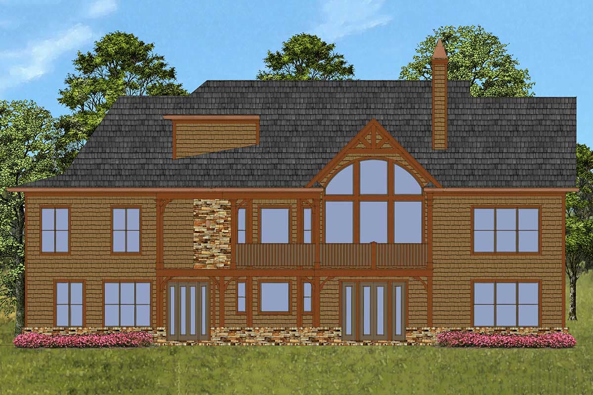 House plan exterior: two-story, timber-framed structure with stone accents, multi-pane windows, gabled dormer, and arched window.