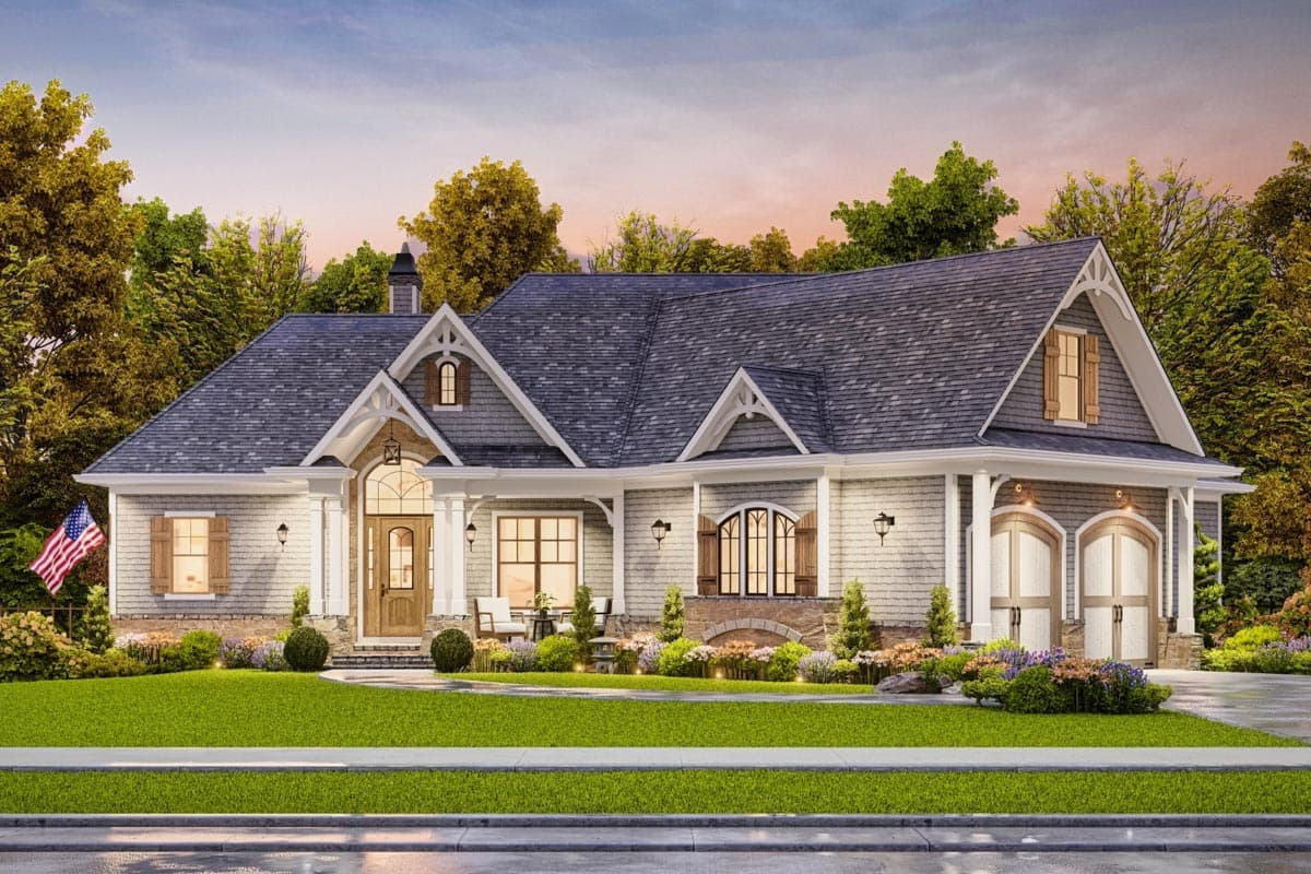 House plan exterior: Single-story home with a covered entry, dormers, and a side-facing two-car garage.