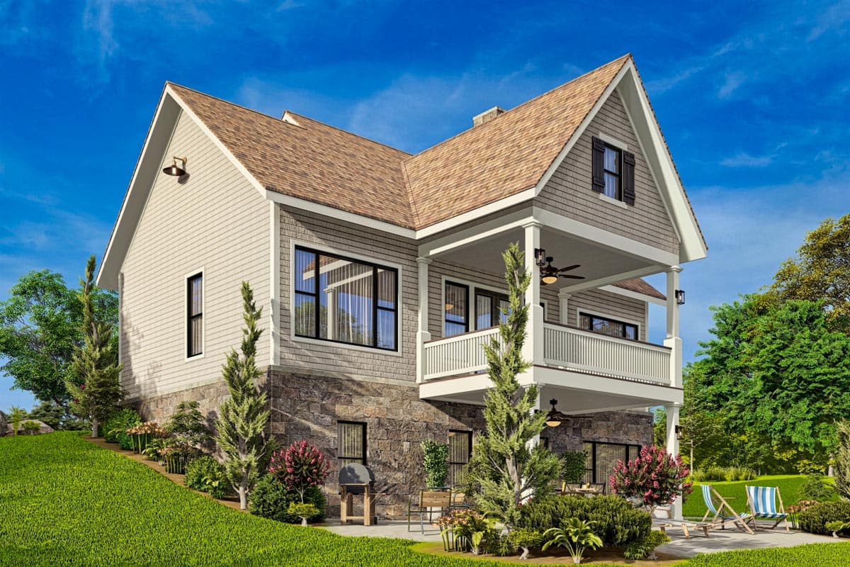 House plan exterior: Two-story home with shingle siding, stone base, and covered upper balcony with porch ceiling fans.