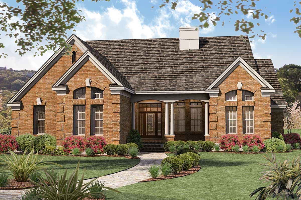 House plan exterior: brick one-story home with covered front porch, columns, arched dormers, and steep gables.