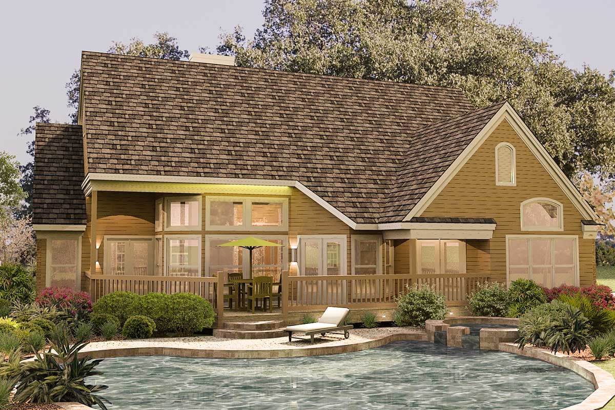 House plan exterior: Two-story home with gabled roof, wide deck, large windows, and an arched dormer.