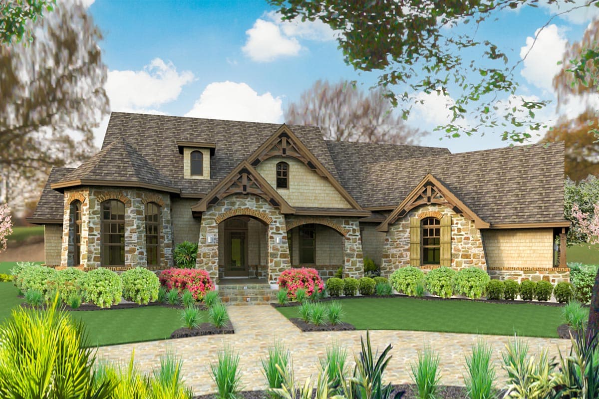 House plan exterior: two-story stone and shingle home with arched entryways, multiple gables, and a bay window.