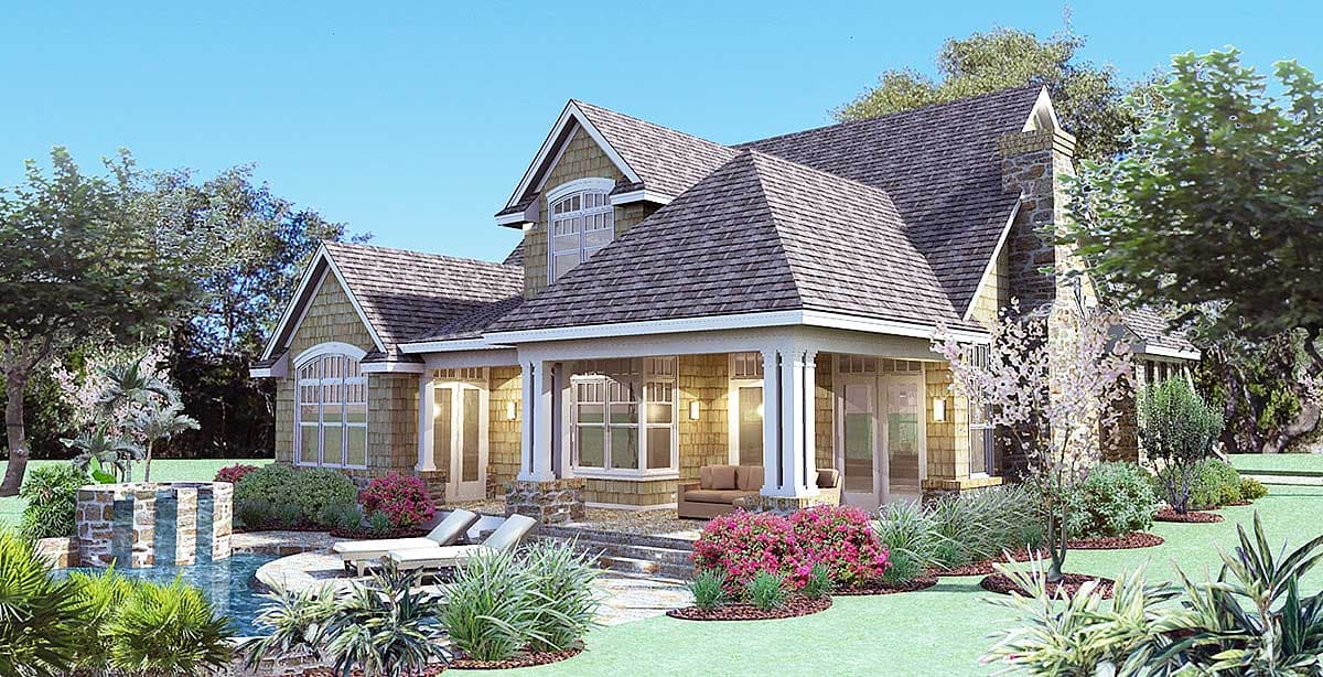 House plan exterior: Two-story Craftsman home with wraparound porch, stone chimney, and arched window.