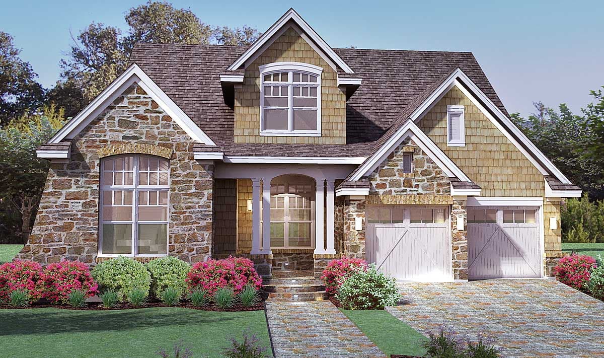 House plan exterior showing stone and shingle facade, dormer, arched window, covered porch, and two-car garage.