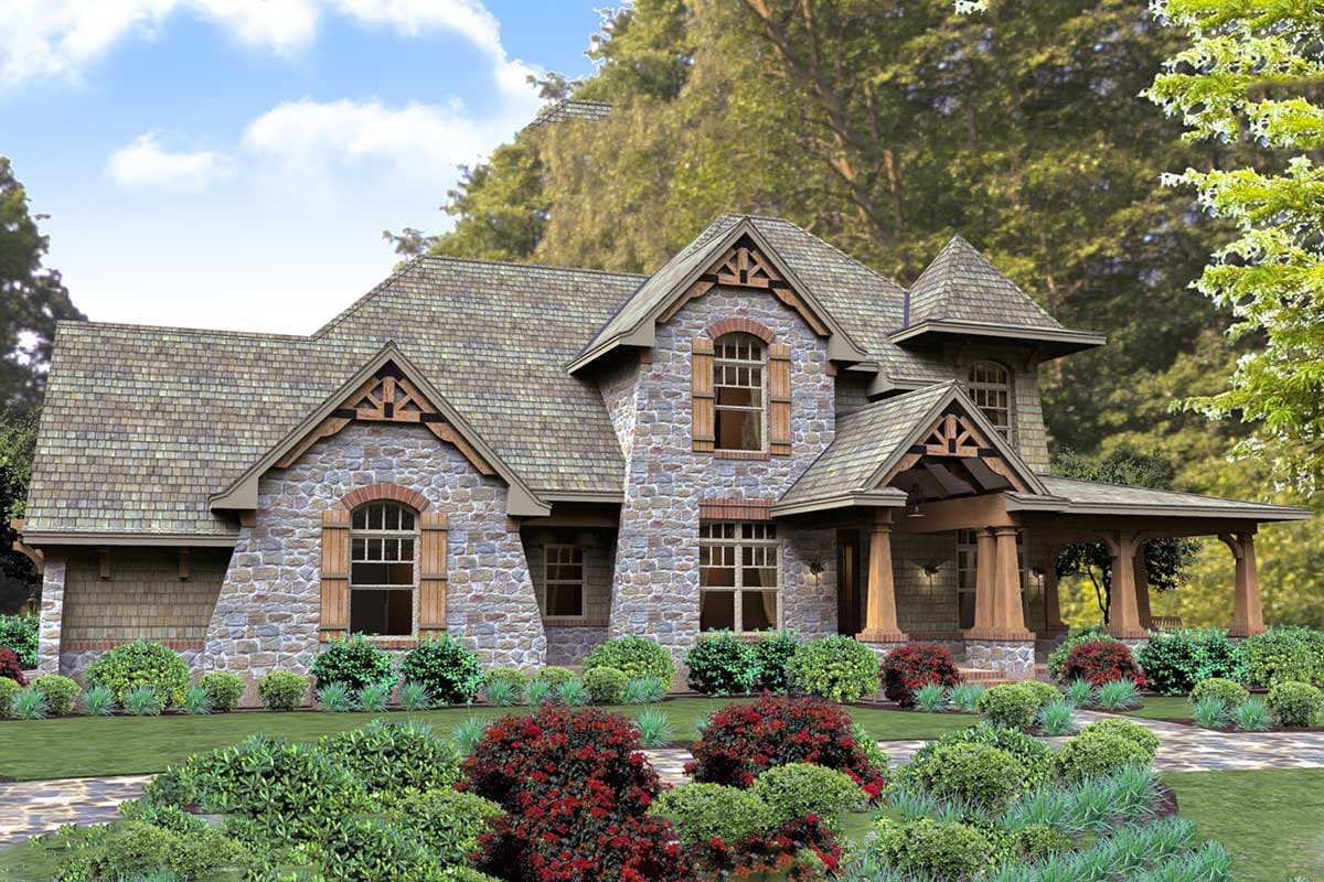 House plan exterior with stone facade, wood accents, steeply pitched rooflines, gables with decorative trusses, and a covered porch.