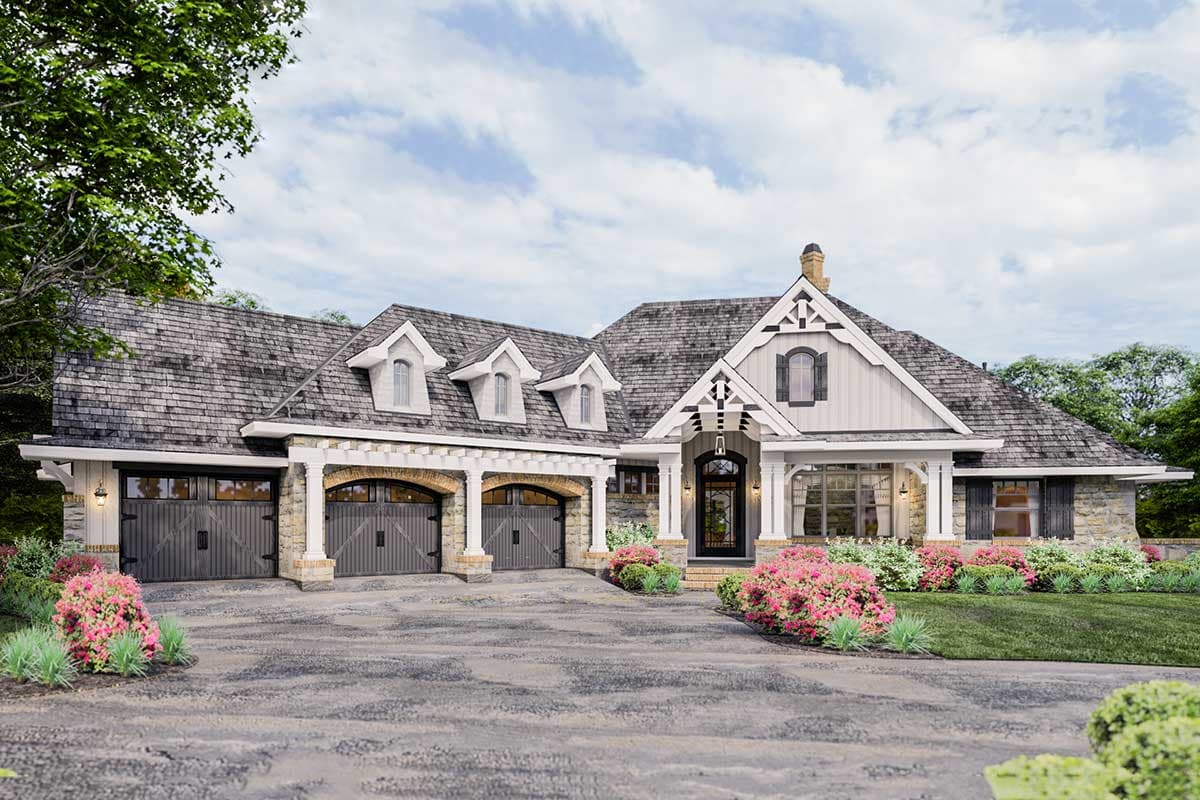 House plan exterior with stone accents, three garage bays, dormers, and a covered front porch.