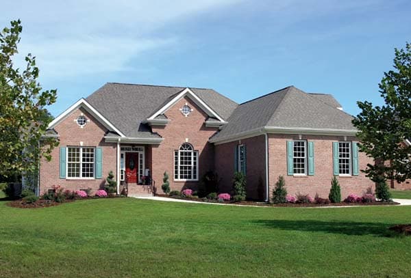 House plan exterior: Brick, one-story home with central gable, arched window, and covered entry with columns.