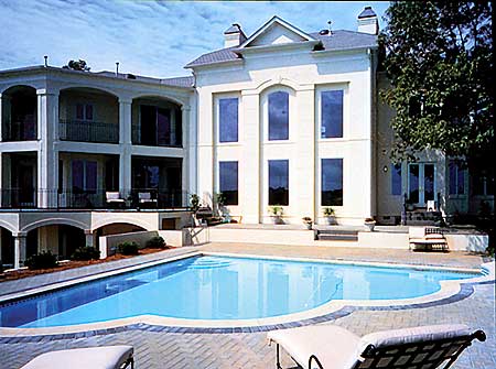 Exterior house plan: Classical style, multiple stories, arched balconies, tall rectangular windows, and prominent gables.