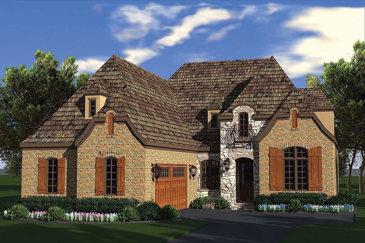 House plan exterior. Two-story French Country style home with brick and stone facade, dormers, and gabled rooflines. Includes attached garage.