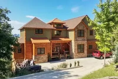 Lodge Home Plan with Second Floor Bridge