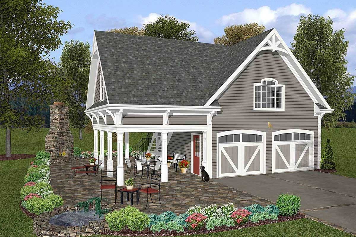 House plan exterior: Two-story, gray siding, white trim, gable dormer, covered patio, and two-car garage.