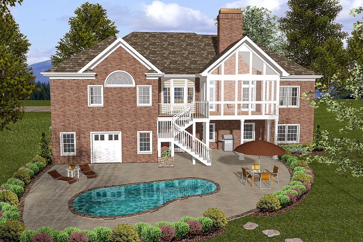 House plan exterior: Two-story brick home with a prominent gable, large multi-pane windows, detached garage, and an outdoor deck with stairs.