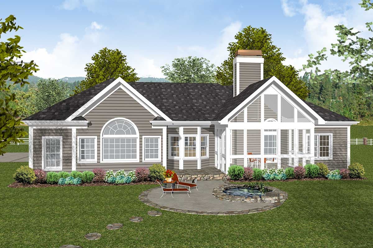 House plan exterior: single-story home with gables, a bay window, and a sunroom with a cathedral ceiling.