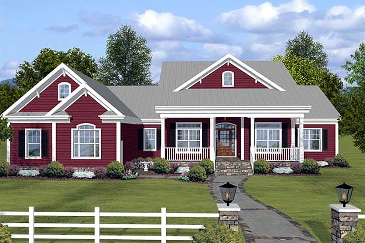 House plan exterior: One-story ranch with covered front porch, gables with arched dormers, and white picket fence.