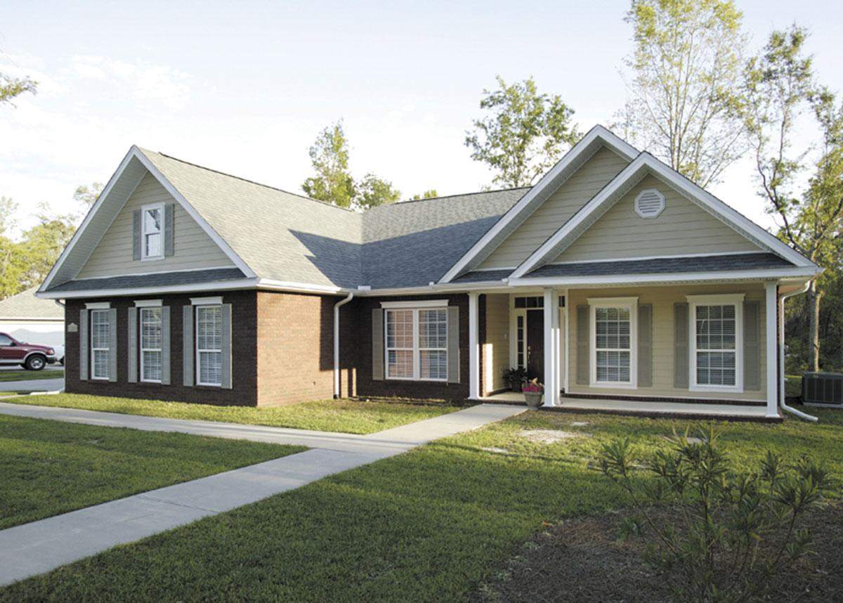 House plan exterior of a one-story home with brick and siding, prominent gables, a covered front porch, and multiple windows with shutters.