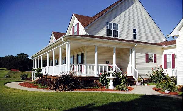 House plan exterior of a two-story home with a wraparound porch, dormers, and vinyl siding.