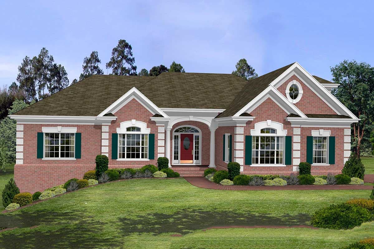 House plan exterior: brick ranch with arched entryway, multipane windows, dormer with oval window, and symmetrical gables.