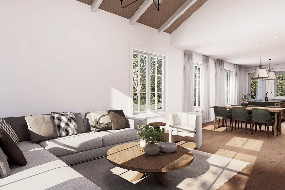 Living and dining area rendering with vaulted wood-beamed ceiling, sectional sofa, dining table, and large windows.