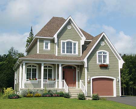 House plan exterior: Two-story Modern Farmhouse with gabled dormers, arched windows, covered front porch with white railing, and attached garage.