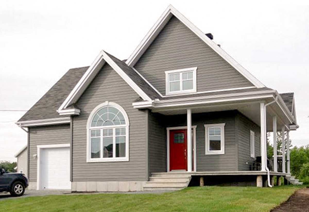 House plan exterior: Two-story Modern Farmhouse with gabled roof, arched window, covered porch, and attached garage.