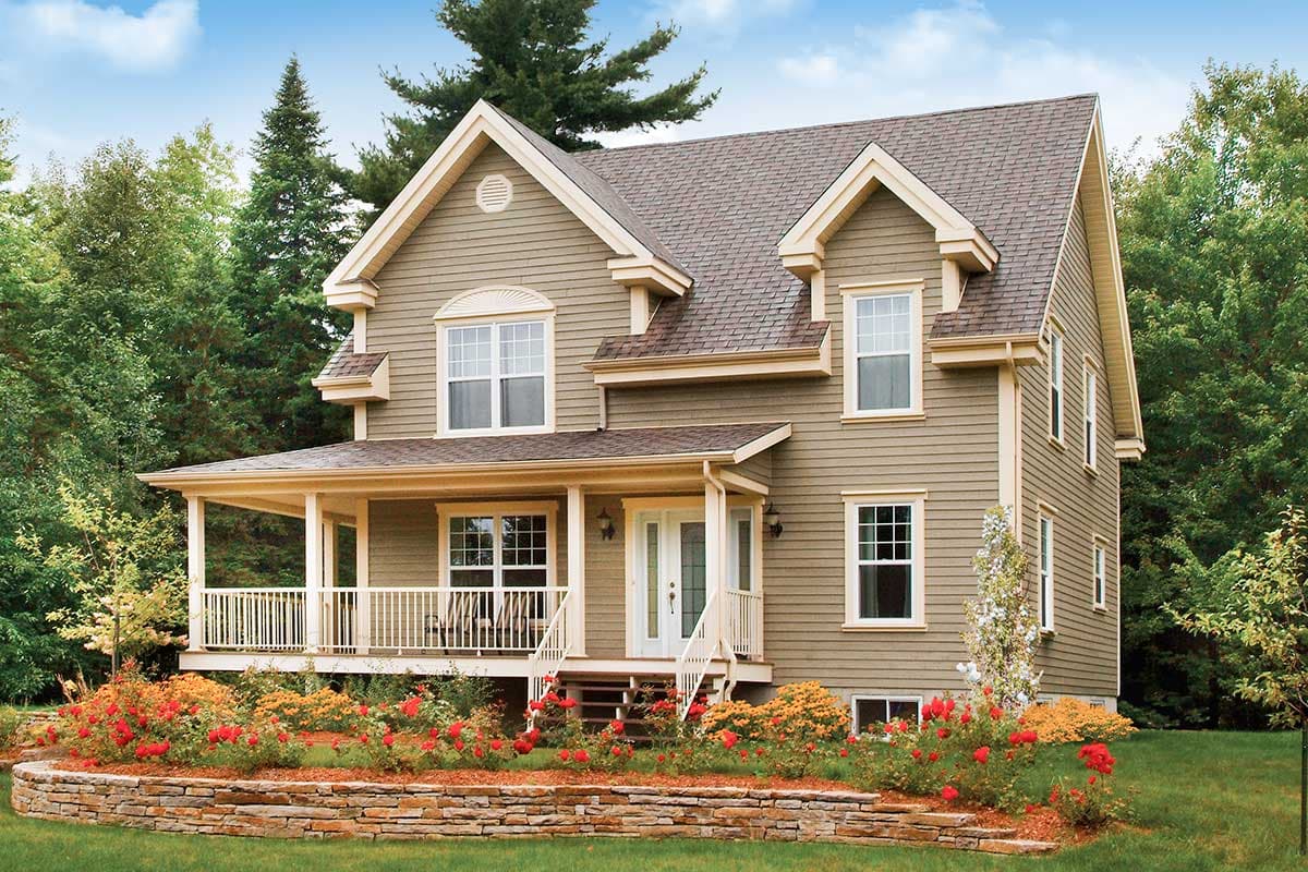 House plan exterior. Two-story home with a porch, gabled roof, and dormers. Features include a front entry with a covered porch.