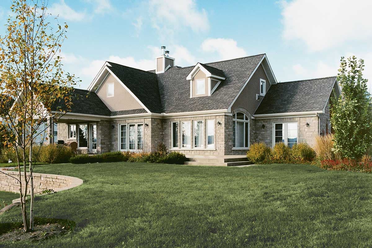 House plan exterior: Stone facade, dormer windows, covered porch, multiple gables, and arched window.