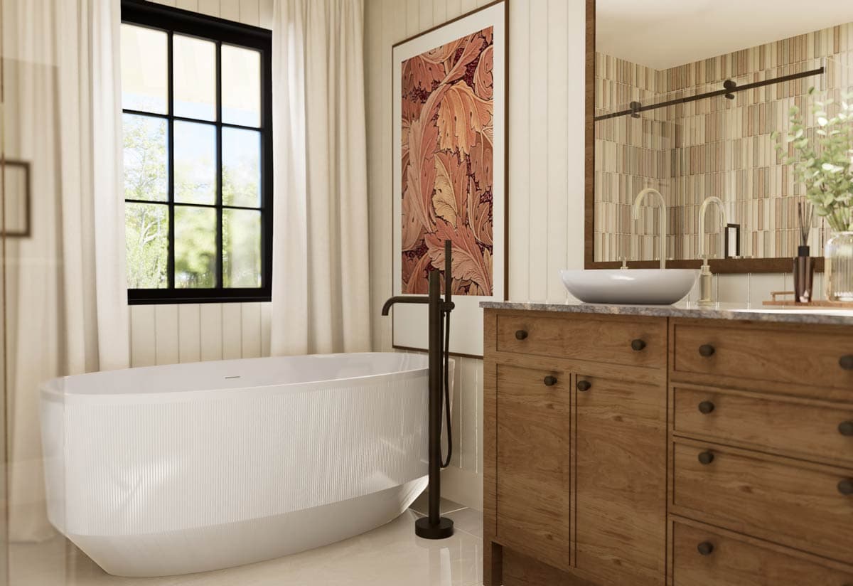 Modern bathroom with a freestanding bathtub, wooden vanity, and large framed artwork. The space has a neutral color palette with natural light.