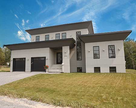 Modern house plan exterior: two stories, flat rooflines, a covered entry porch, and a three-car garage.