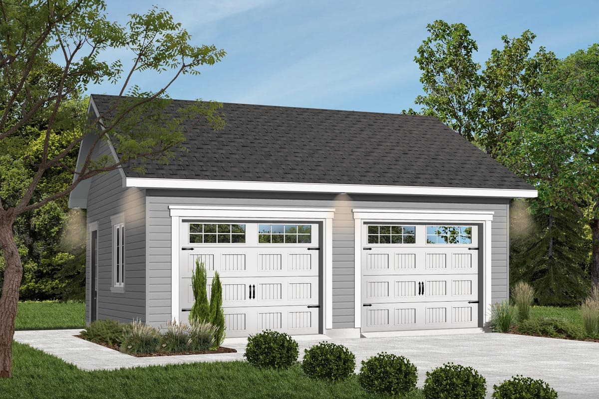 House plan exterior showing a two-car garage. Features include a gable roof, two overhead doors with window panes, and a concrete driveway.