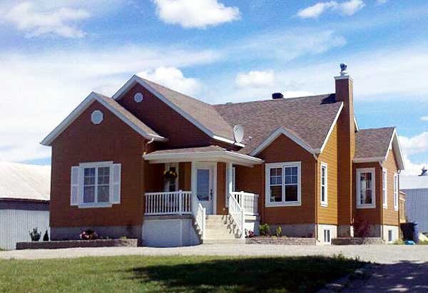 House plan exterior of a one-story home with a covered entry porch, prominent gables, and a brick chimney.