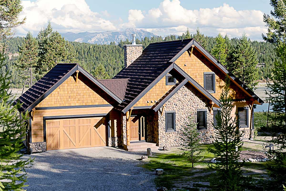 House plan exterior with stone and wood siding, prominent gables, timbered eaves, and a side-facing garage.