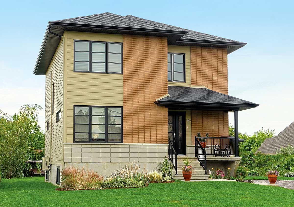 Two-story house plan exterior with light tan siding, brick facade, covered front porch, and dark-framed windows.